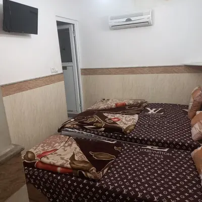 مسافرخانه تابان - واحد سه تخته غربی