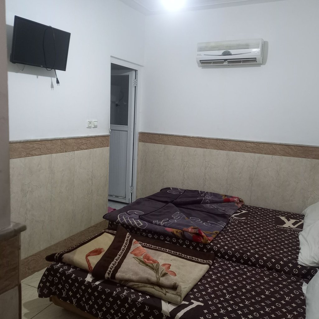 مسافرخانه تابان - واحد سه تخته غربی