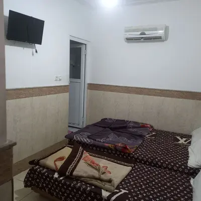 مسافرخانه تابان - واحد سه تخته غربی