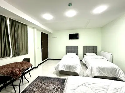 هاستل میر عماد - واحد چهارتخته خانواده ۱۷