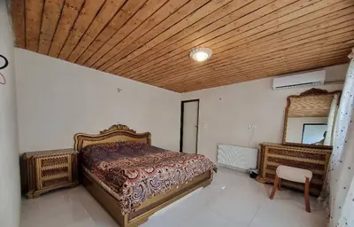 ویلا سه خوابه استخردار آبگرم باغ امین 1