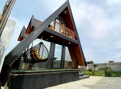 کلبه یک خوابه سوئیسی چوبی جکوزی دار پالم