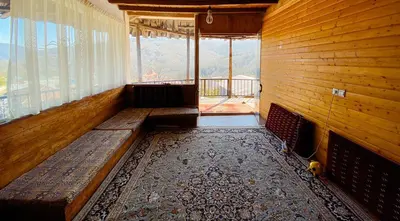 کلبه ایران منش - واحد نشیمن شیشه ای