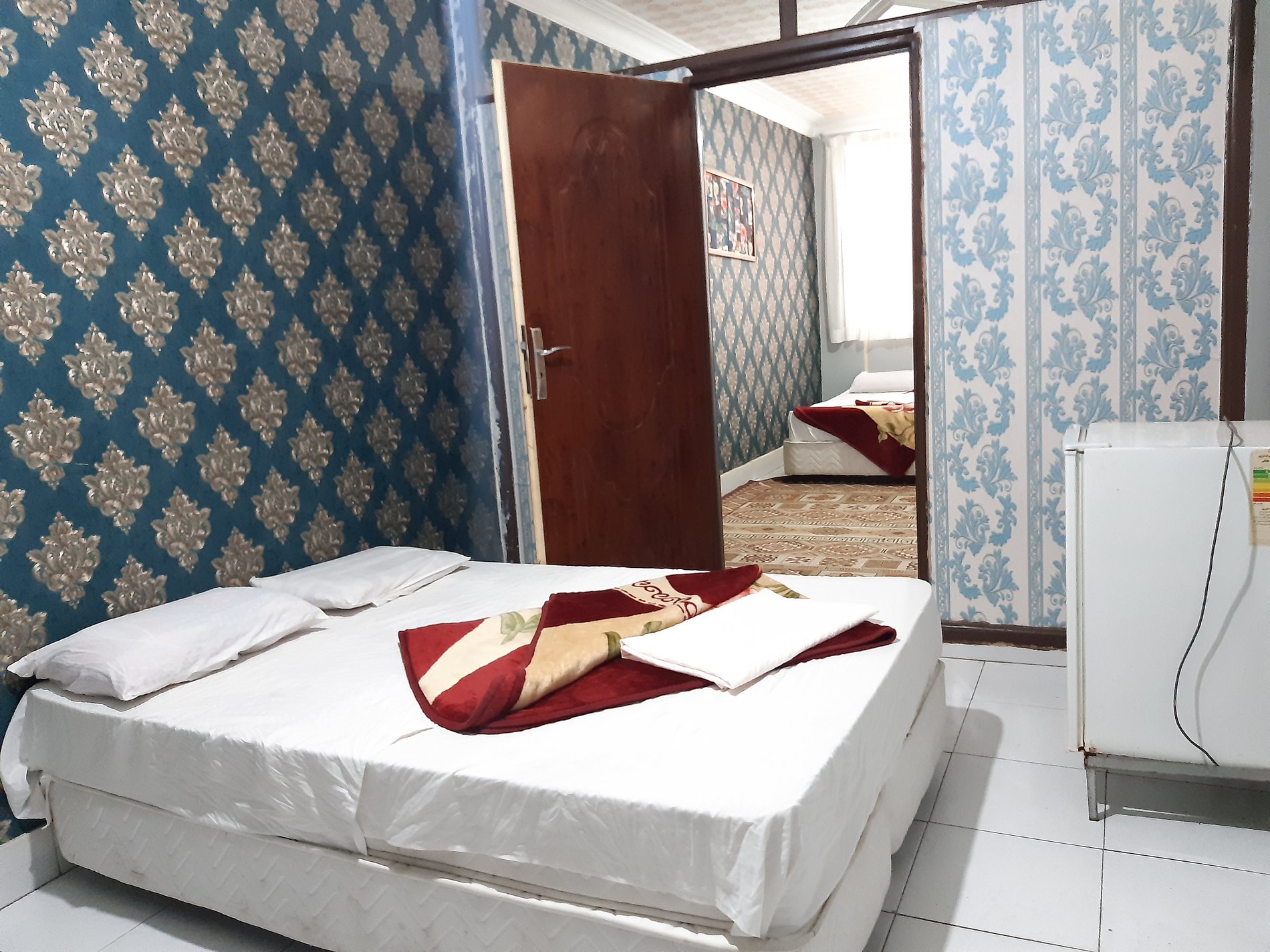 مسافرخانه یک خوابه چهار تخته