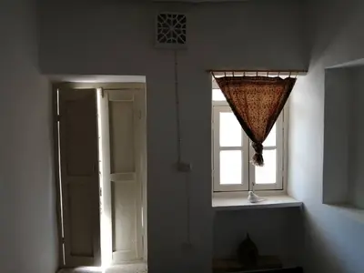 بومگردی نیمروز سروستان - واحد بالاخانه میانی