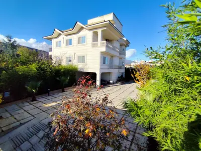 ویلا چهارخوابه استخردار آبگرم باغ بهشت