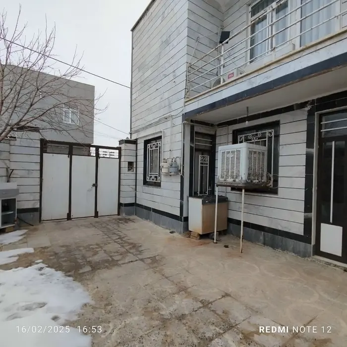 سوئیت یک خوابه فرهنگ ۳ - نمای داخل حیاط و درب ورودی سوئیت فرهنگ ۳