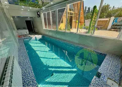 کلبه دوخوابه استخردار آبگرم طاووس