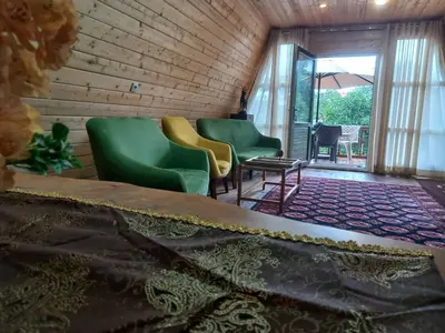 کلبه سوئیسی دوخوابه جنگلی جکوزی دار گوهر