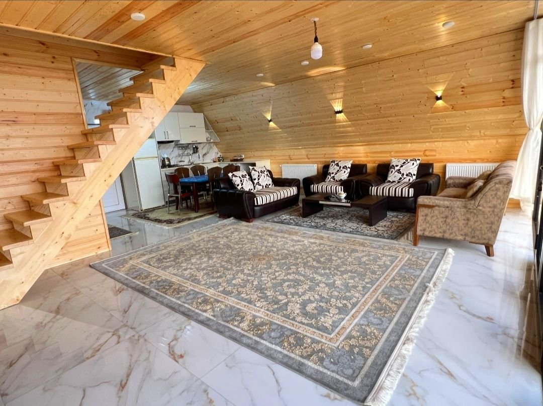 کلبه دوخوابه سوئیسی قصر چوب