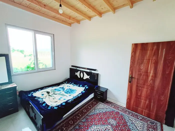 کلبه دوخوابه سوئیسی افشار - اتاق خواب پایین