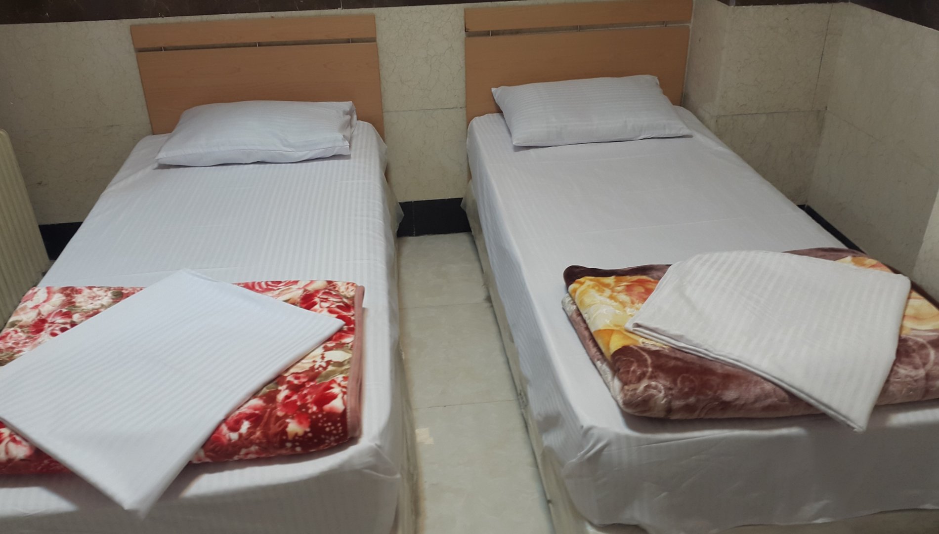 مسافرخانه مهران ولیعصر - اتاق چهار تخته